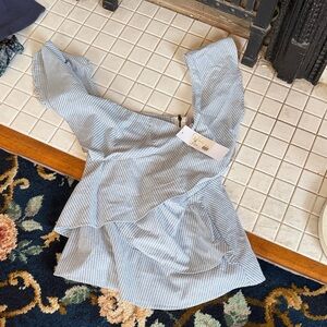 Shills power stripe peplum top. NWT . Retail 130